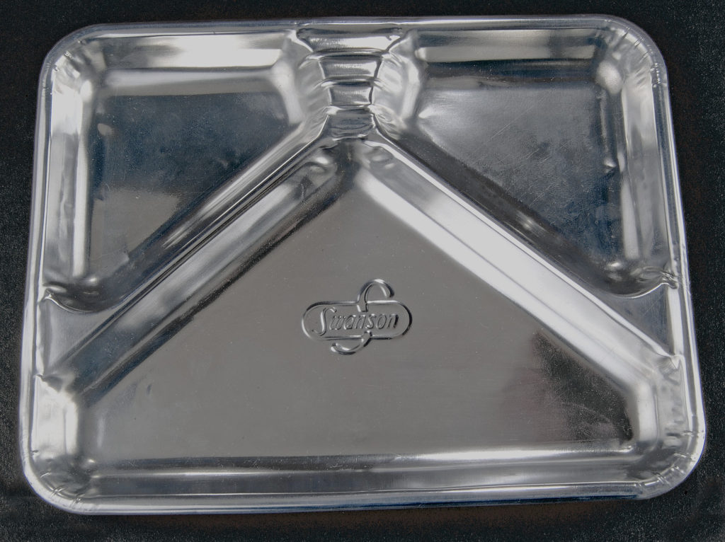 Swanson three-compartment aluminum tray.